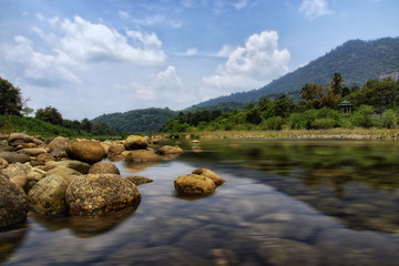 Un-focus image of Brook and rocks in the mountains