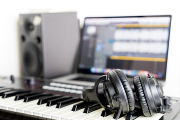 Home Studio recording Equipment with keyboard and headphone