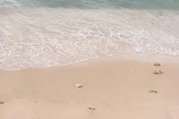 wave on to the beach