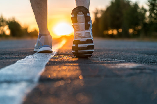 Runner Feet Running On Road Closeup