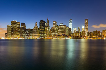Fototapeta na wymiar Panorama of Brooklyn Bridge and Lower Manhattan by night