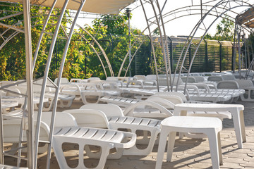 Empty sunbeds at the pool