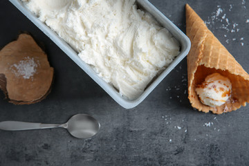 Composition with fresh coconut ice cream on table