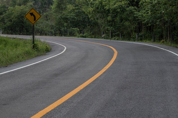 Asphalt road curve transportation.