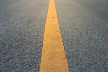 Fototapeta premium Asphalt road texture line yellow background.