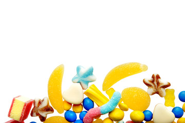 Colorful candies on white background
