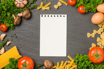Italian spaghetti photo recipe. Stationary mockup on the kitchen table surrounded with products.
