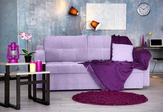 Interior of modern room with lilac decorative elements