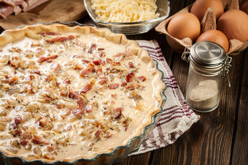 Making stuffing while preparing a traditional quiche