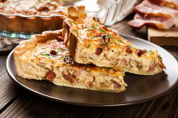 Pieces of quiche lorraine with bacon and cheese