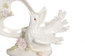 Wedding doves. Symbol of love and wedding. A figurine on a white background. Isolated