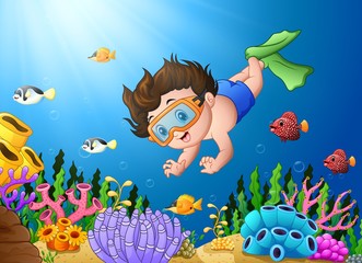 Fototapeta na wymiar Cartoon boy diving in the sea 