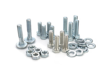 Nuts, washers, bolts on white background