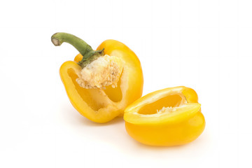 Fototapeta na wymiar Yellow sweet pepper cut on a white background