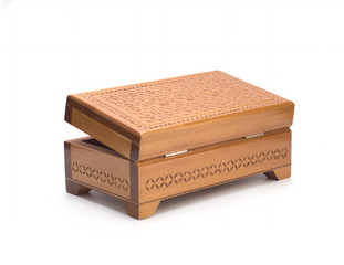 Wood carving, wooden box on a white background. Isolated