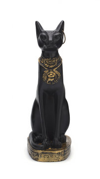 Statuette of an Egyptian cat on a white background