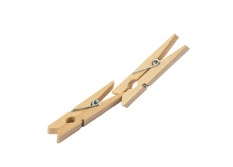 The clothespin of wood. The clothespin clamps are another. Isolated on white background (with clipping path).