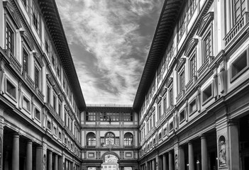 Superb black and white view of the courtyard of the Uffizi Galleries from Palazzo Vecchio, historic center of Florence, Italy