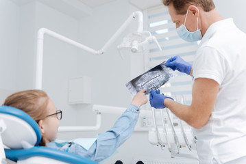 Lovely qualified doctor explaining the diagnosis