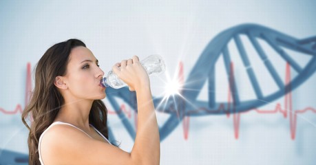 Young woman drinking water against DNA 