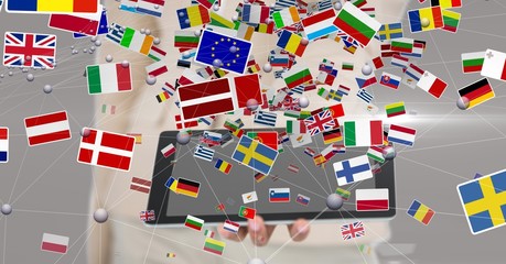 Various flags flying over tablet PC