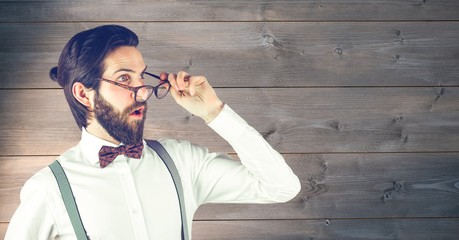 Shocked hipster wearing eyeglasses 