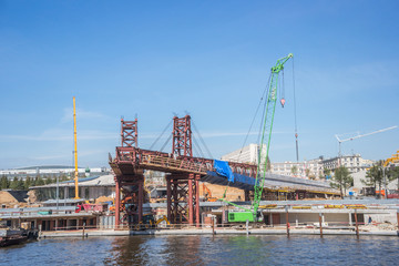 Construction of "Floating  pedestrian Bridge" Zaryadye park,  in front of the Moscow Kremlin Russia