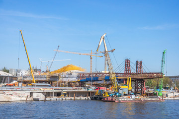 Construction of "Floating  pedestrian Bridge" Zaryadye park,  in front of the Moscow Kremlin Russia