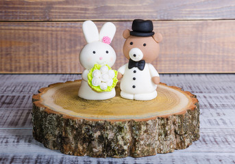 two-tier fondant wedding lace cake with bear and bunny