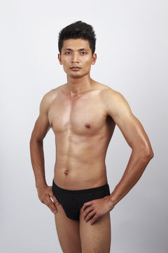 attractive male body with black underwear