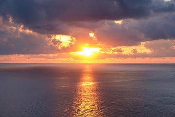 Naklejka na ściany i meble Viewpoint beautiful sunset over the sea