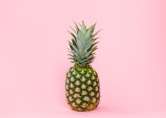 Isolated pineapple on pink background
