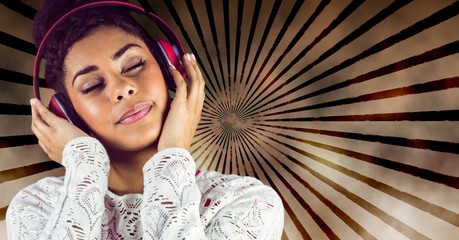 Young woman enjoying music on headphones