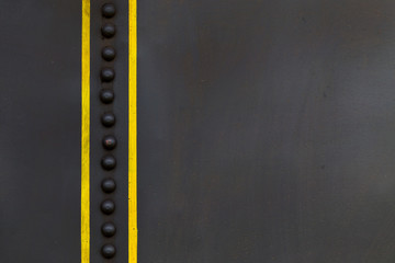 metal background with yellow bars