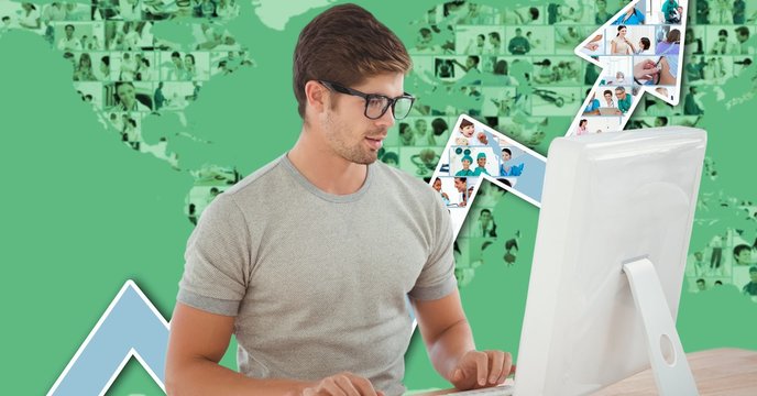 Businessman using computer against graph