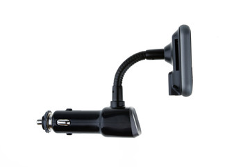 Mp3 Fm transmitter with remote control isolated on white background. It plays mp3, you listen on fm channel on car radio