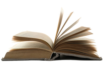 Opened vintage book in an old cloth cover lies on a white isolated background. Horizontal frame