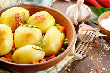 Boiled and baked potato and vegetables