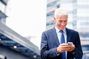 Portrait of confident businessman outdoors