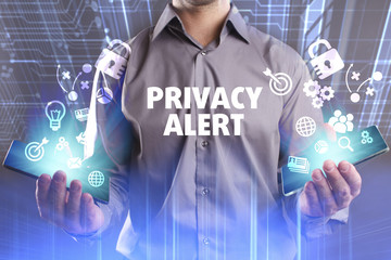 Business, Technology, Internet and network concept. Young businessman working on a virtual screen of the future and sees the inscription: Privacy alert