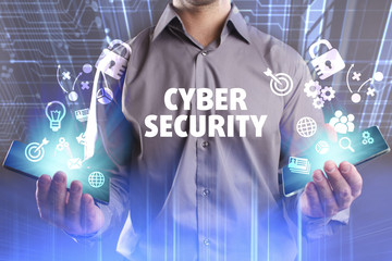 Business, Technology, Internet and network concept. Young businessman working on a virtual screen of the future and sees the inscription: Cyber security