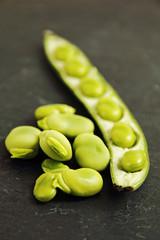 Bean pod on black background