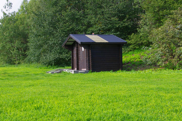 Norway summer landscape. Green bright grass.