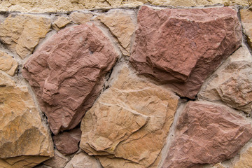 Old stone wall. / Wall of the old large stones, beige and brown shades.