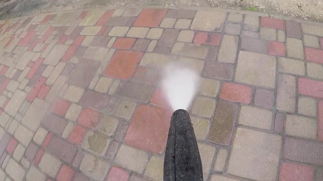 pavement cleaning with high pressure washer