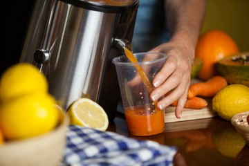 Female staff preparing a juice