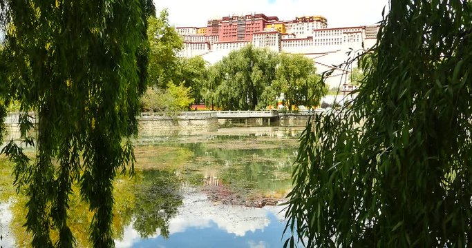 4k Potala reflection on lake in Lhasa park,Tibet.lake with willow.