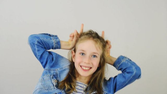 Smiling little girl having fun.