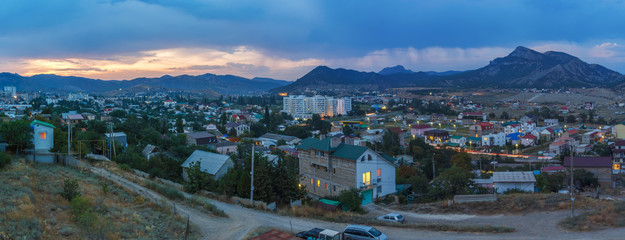 Город Судак в Крыму вечером