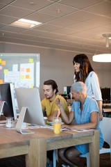 Creative business team working together on desk